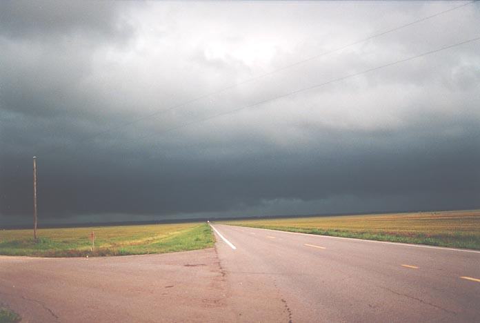 cumulonimbus thunderstorm_base : SW of Elk City along route 283 Oklahoma, USA   19 May 2001